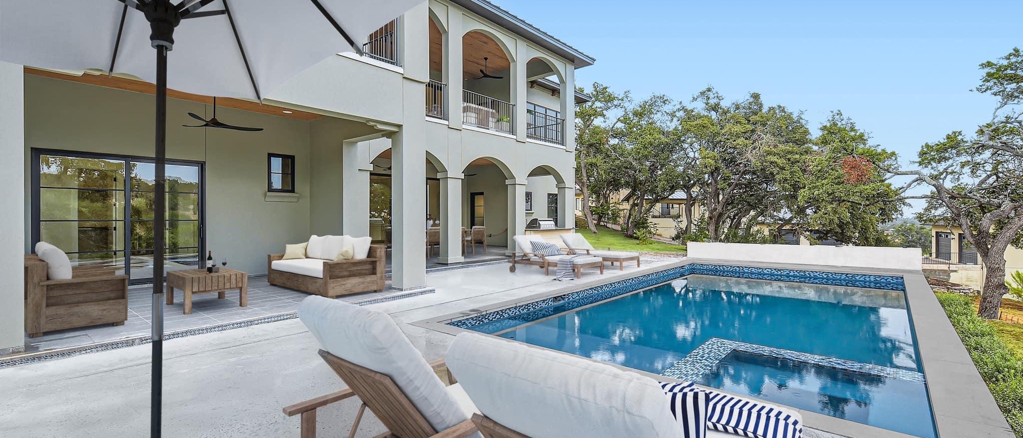 Capital Hills Development custom home exterior with pool, Belvedere Subdivision